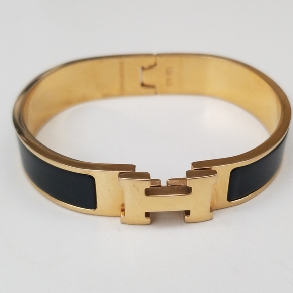 Hermes Jewelry - Hermes Black and Gold Bracelet